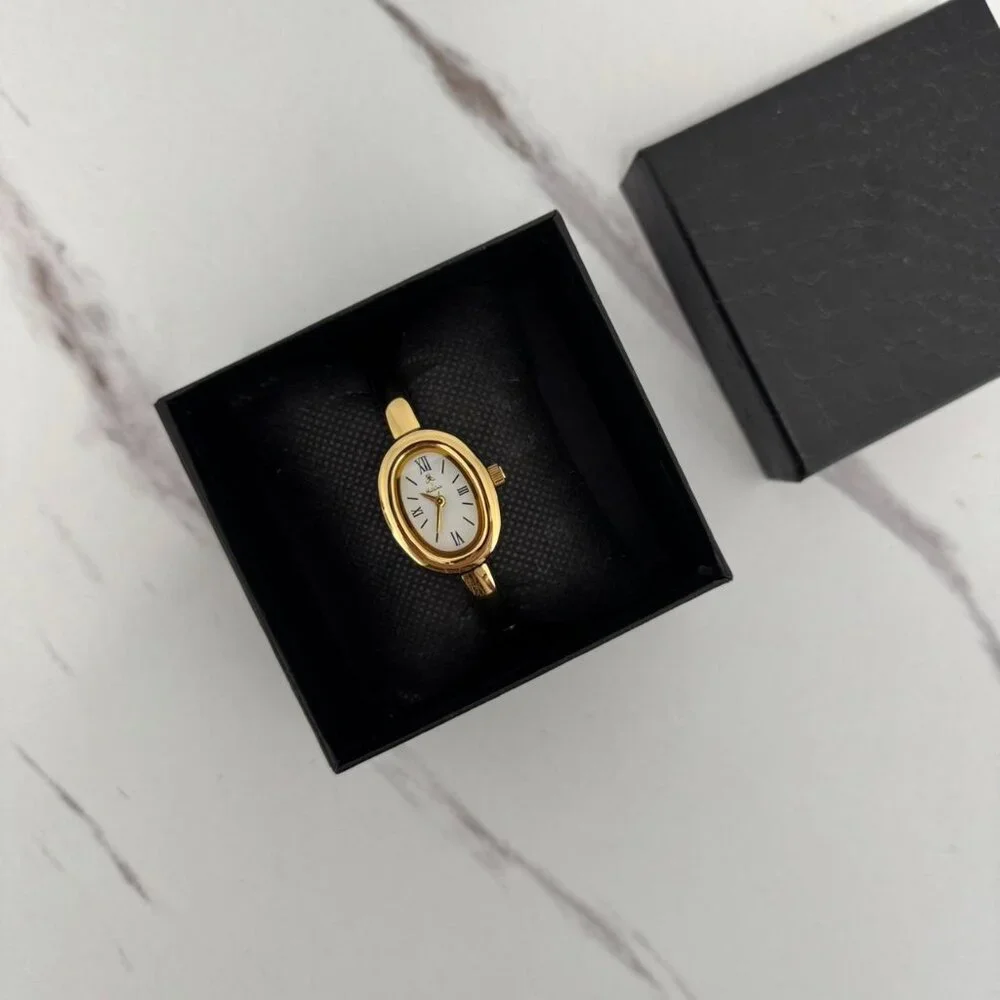 American Vintage Gold Bangle Oval Watch with White Dial